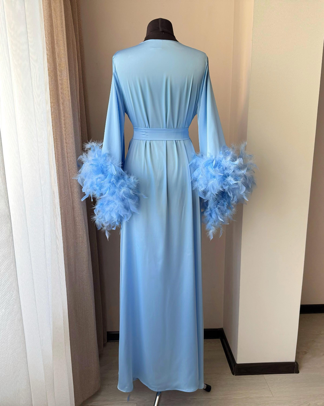 Light blue feather sleeves
