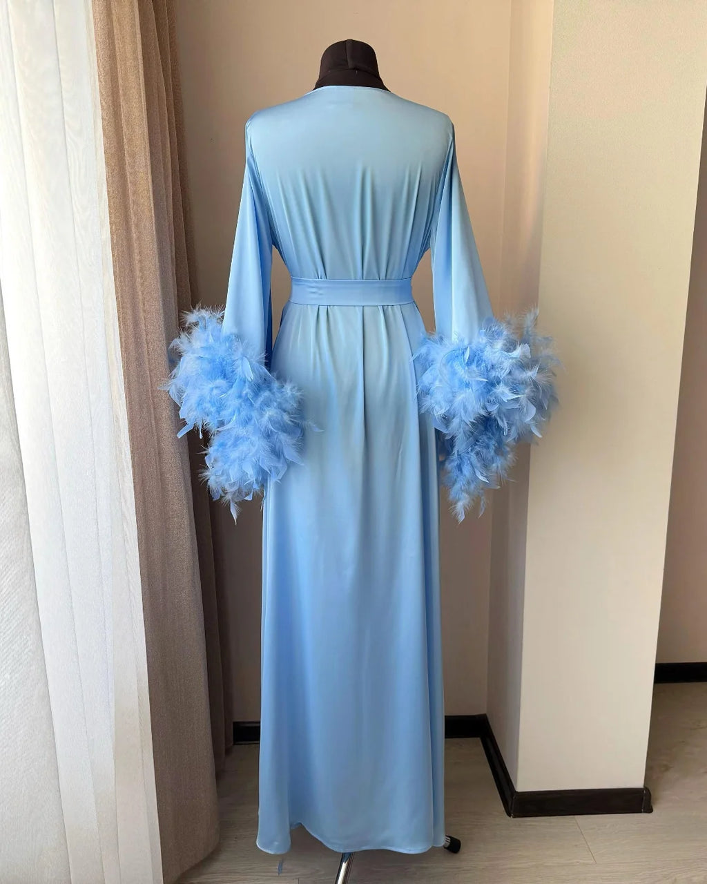 Light blue feather sleeves