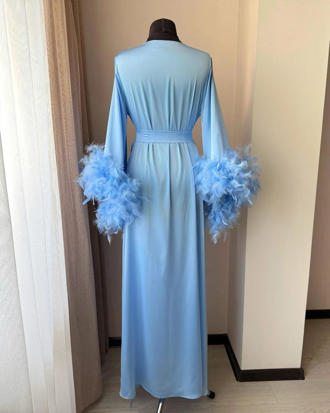 Light blue feather sleeves