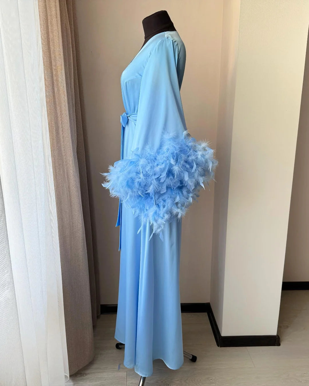 Light blue feather bridal robe detail