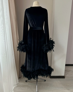 Black velvet feather robe detail