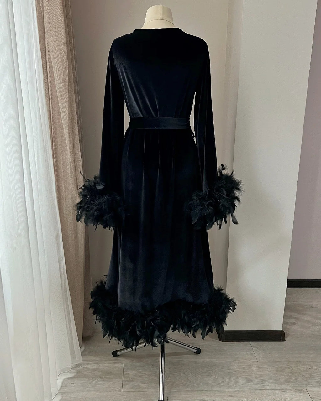 Black velvet feather robe detail