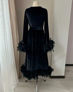 Black velvet feather robe detail