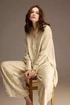 Woman wearing pistachio bamboo linen jacquard pajama set with long-sleeve shirt and wide-leg trousers — Belle Bonjour BM-1901