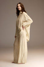 Side view of the pistachio bamboo linen pajama set showing the wide-leg trousers — Belle Bonjour BM-1901
