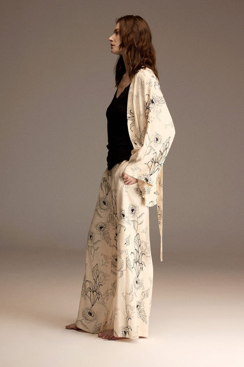 Woman wearing an ivory floral jacquard robe with matching wide-leg trousers — Belle Bonjour BM-1954
