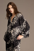 Black and ivory printed viscose shirt shown close up — Belle Bonjour BM-1966