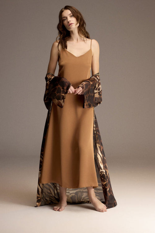 Woman wearing a long animal-print satin robe over a caramel satin nightgown — Belle Bonjour BM-1909
