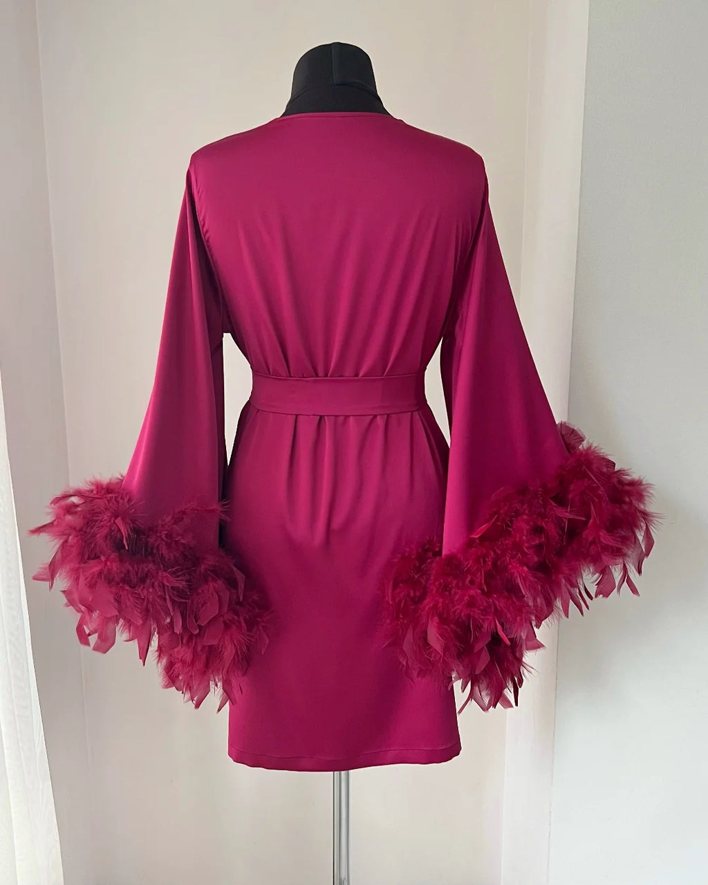 Burgundy feather bridal robe sleeve