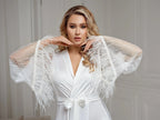 Lace feather sleeve detail